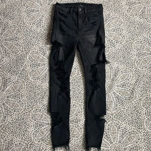 Black ripped next level stretch skinny jeans
